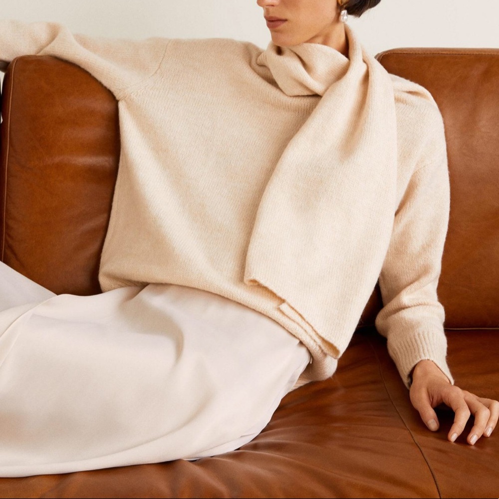 Knit sweater with attached scarf